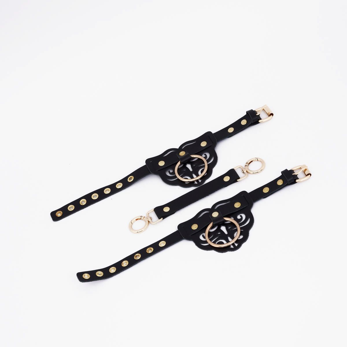 Черные оковы с золотистой фурнитурой — изображение 2